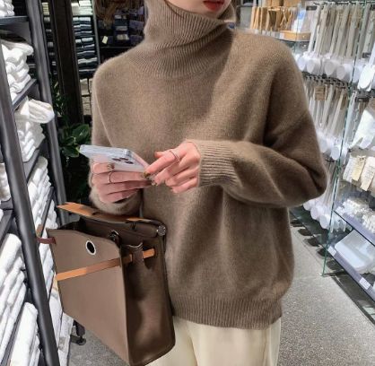 Women's knit pullover with turtleneck