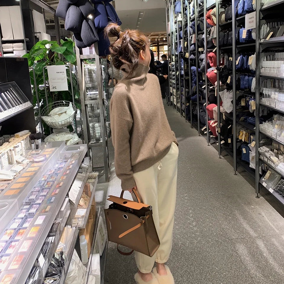 Women's knit pullover with turtleneck