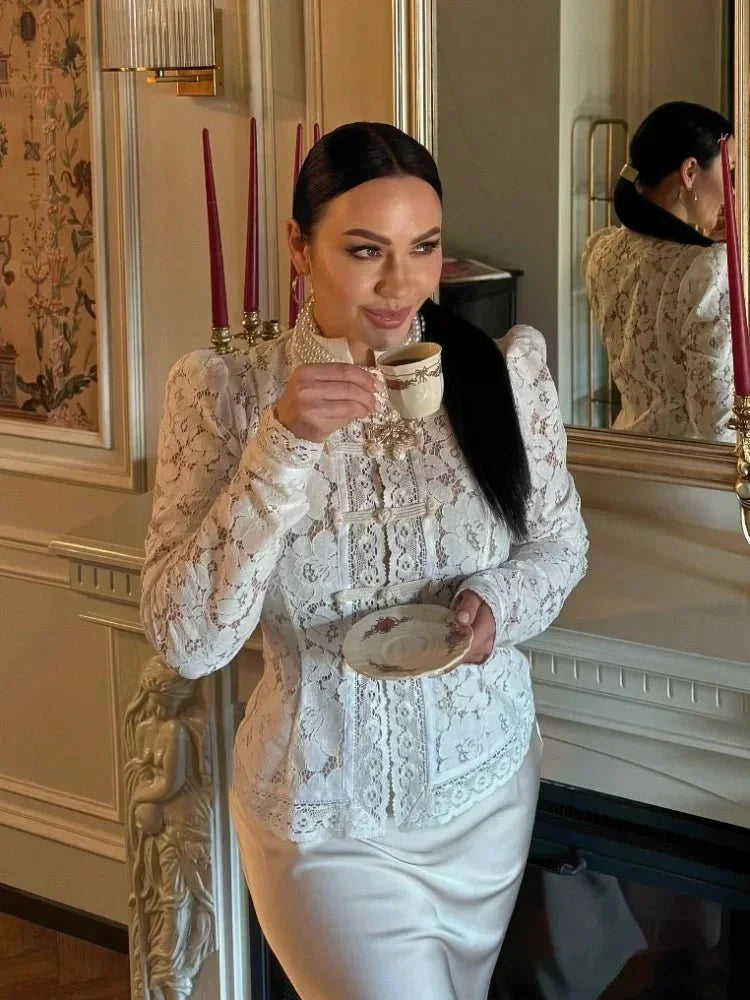 Women's lace blouse with puff sleeves