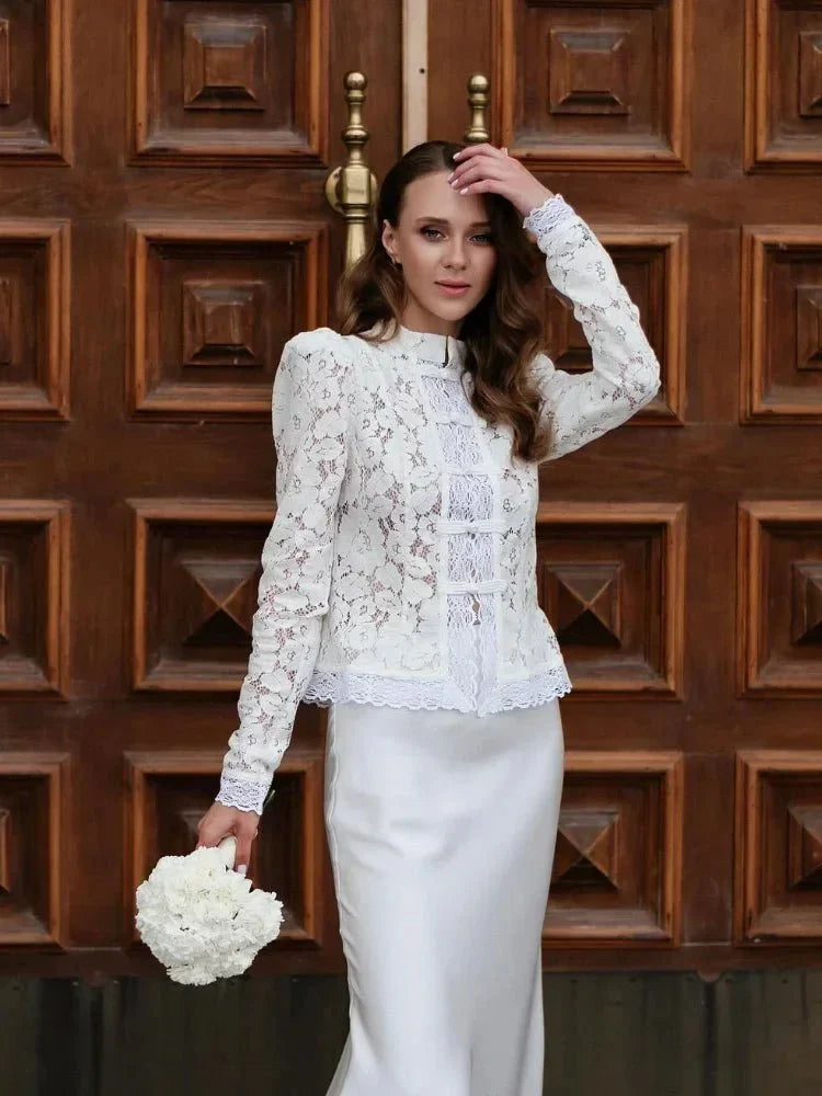 Women's lace blouse with puff sleeves