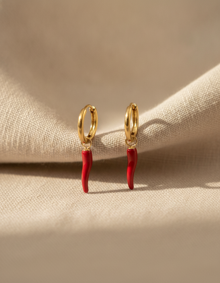 oorbellen met rode pepertjes goudkleurig - studio